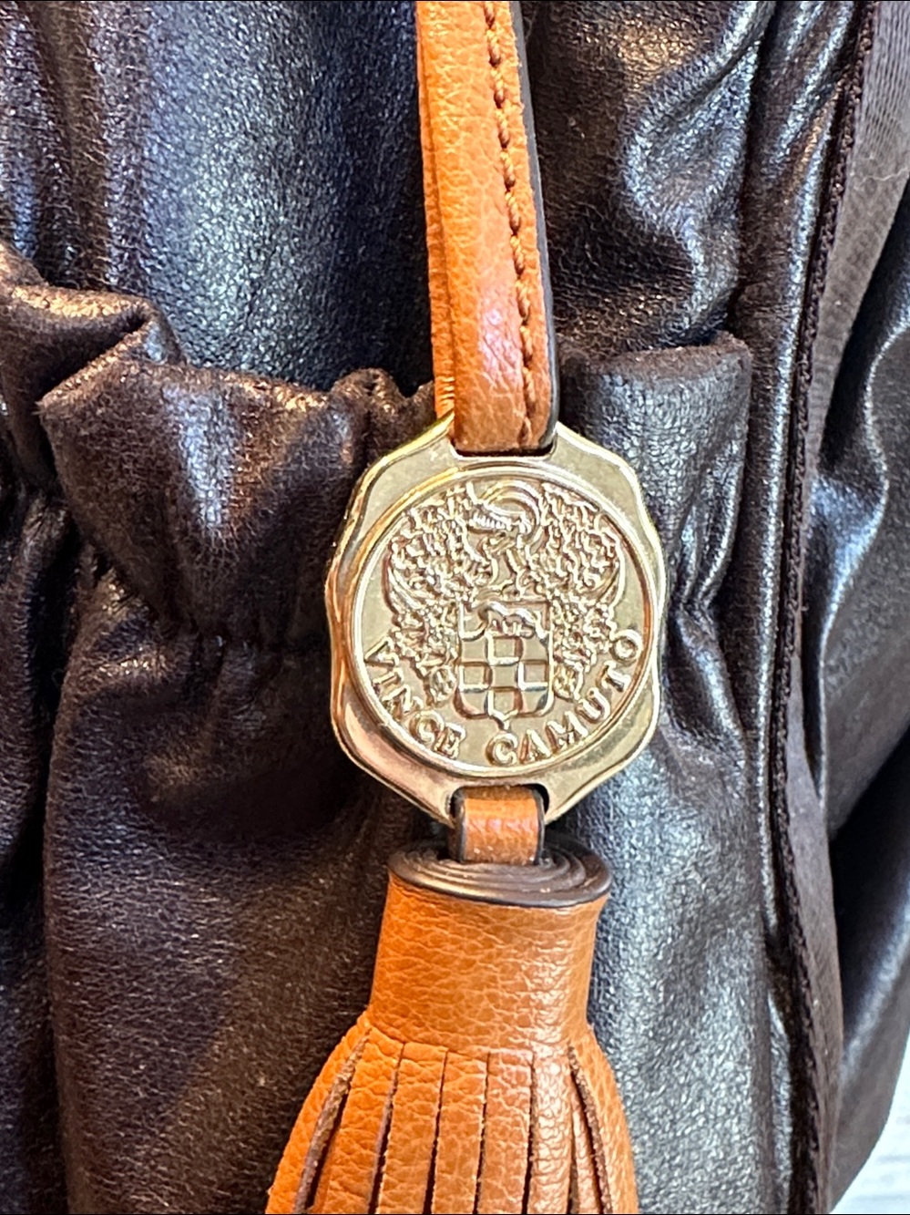 Vince Camuto Cognac Brown Genuine Leather Tassel Charm with Gold Medallion